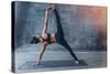 Woman Practicing Yoga in a Urban Background (Side Plank Pose, Vasisthasana)-Luna Vandoorne-Stretched Canvas