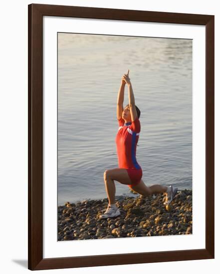 Woman Practicing Yoga on the Riverside, Bainbridge Island, Washington State, USA-null-Framed Photographic Print