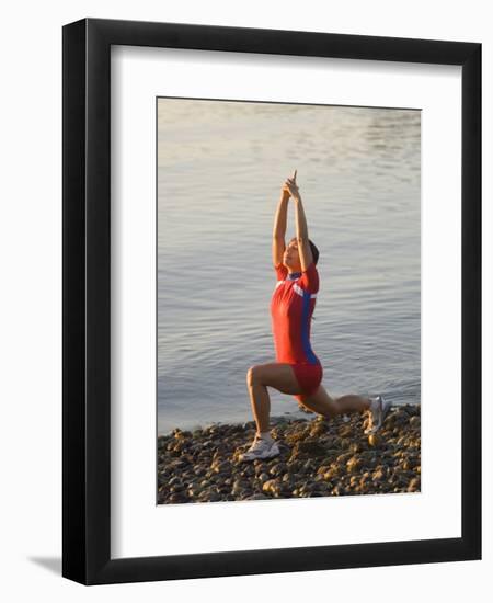 Woman Practicing Yoga on the Riverside, Bainbridge Island, Washington State, USA-null-Framed Photographic Print