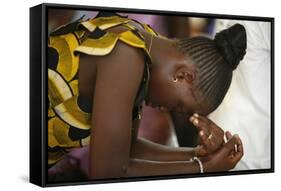 Woman praying at mass in Popenguine, Popenguine, Thies, Senegal-Godong-Framed Stretched Canvas