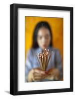 Woman praying with incense sticks in hands, Thien Hung Buddhist temple (Saigon)-Godong-Framed Photographic Print