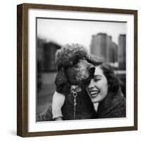 Woman Profiling a Big Smile While Adoring Her Poodle Wearing Large Swiss Watch on Dog Collar-Yale Joel-Framed Photographic Print