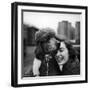 Woman Profiling a Big Smile While Adoring Her Poodle Wearing Large Swiss Watch on Dog Collar-Yale Joel-Framed Photographic Print