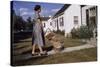 Woman Pushing Shopping Cart to House-William P. Gottlieb-Stretched Canvas
