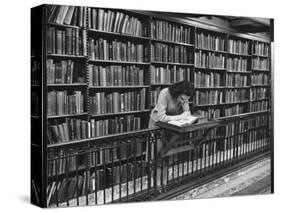 Woman Reading Book Among Shelves on Balcony in American History Room in New York Public Library-Alfred Eisenstaedt-Stretched Canvas