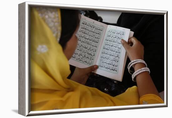 Woman reading Kuranic scriptures in Nizamuddin Dergah, Delhi, India-Godong-Framed Photographic Print