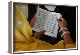 Woman reading Kuranic scriptures in Nizamuddin Dergah, Delhi, India-Godong-Framed Photographic Print