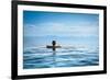 Woman Relaxing in Infinity Swimming Pool on Vacation-Splendens-Framed Photographic Print