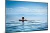 Woman Relaxing in Infinity Swimming Pool on Vacation-Splendens-Mounted Photographic Print