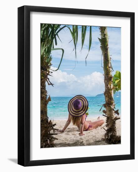 Woman Relaxing on the Beach in Thailand-Netfalls-Framed Photographic Print