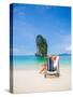 Woman Relaxing on the Beach on a Sunbed in Thailand-Netfalls-Stretched Canvas