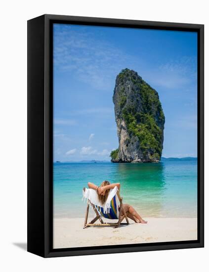 Woman Relaxing on the Beach on a Sunbed in Thailand-Netfalls-Framed Stretched Canvas