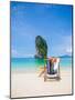 Woman Relaxing on the Beach on a Sunbed in Thailand-Netfalls-Mounted Photographic Print