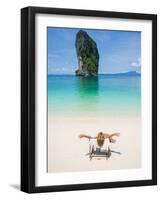 Woman Relaxing on the Beach on a Sunbed in Thailand-Netfalls-Framed Photographic Print