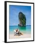 Woman Relaxing on the Beach on a Sunbed in Thailand-Netfalls-Framed Photographic Print