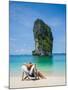 Woman Relaxing on the Beach on a Sunbed in Thailand-Netfalls-Mounted Photographic Print