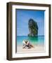 Woman Relaxing on the Beach on a Sunbed in Thailand-Netfalls-Framed Photographic Print