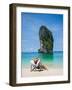 Woman Relaxing on the Beach on a Sunbed in Thailand-Netfalls-Framed Photographic Print