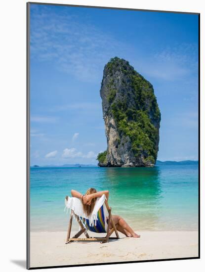 Woman Relaxing on the Beach on a Sunbed in Thailand-Netfalls-Mounted Photographic Print