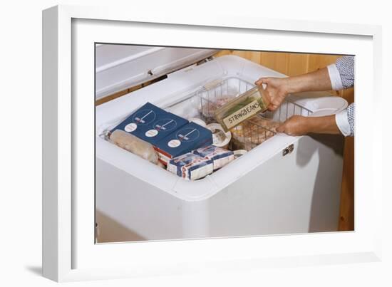 Woman Removing Food from Freezer-William P. Gottlieb-Framed Photographic Print