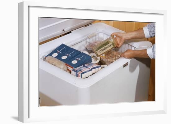 Woman Removing Food from Freezer-William P. Gottlieb-Framed Photographic Print