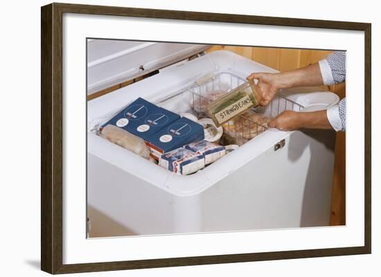 Woman Removing Food from Freezer-William P. Gottlieb-Framed Photographic Print