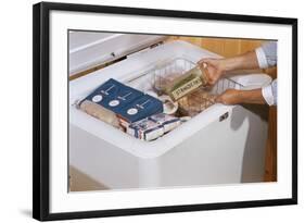 Woman Removing Food from Freezer-William P. Gottlieb-Framed Photographic Print