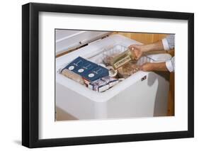 Woman Removing Food from Freezer-William P. Gottlieb-Framed Photographic Print