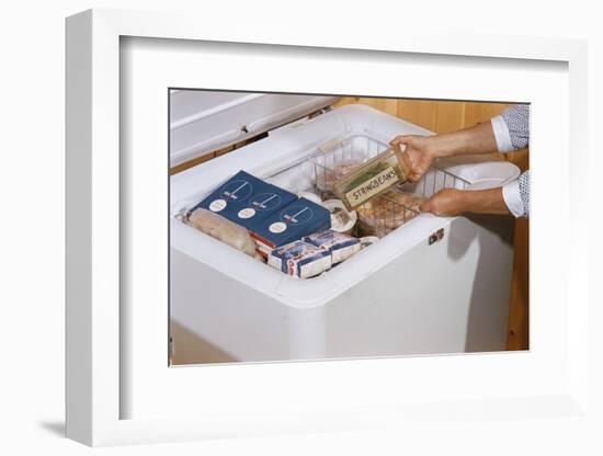 Woman Removing Food from Freezer-William P. Gottlieb-Framed Photographic Print