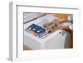 Woman Removing Food from Freezer-William P. Gottlieb-Framed Photographic Print