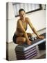 Woman Resting after Working Out in Gym, New York, New York, USA-null-Stretched Canvas