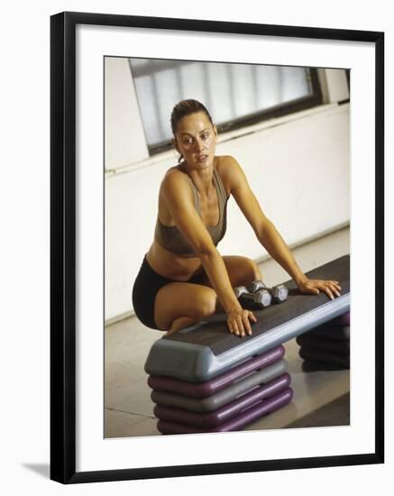 Woman Resting after Working Out in Gym, New York, New York, USA-null-Framed Photographic Print