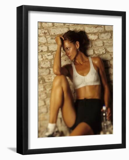 Woman Resting after Working Out, New York, New York, USA-Chris Trotman-Framed Photographic Print
