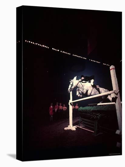 Woman Rider Taking Horse over Jump during National Horse Show-Gjon Mili-Stretched Canvas