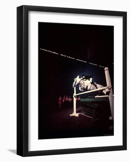 Woman Rider Taking Horse over Jump during National Horse Show-Gjon Mili-Framed Photographic Print