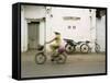 Woman Riding Bicycle Along Street, Ben Tre, Vietnam-Ian Trower-Framed Stretched Canvas