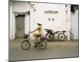 Woman Riding Bicycle Along Street, Ben Tre, Vietnam-Ian Trower-Mounted Photographic Print