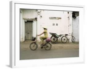 Woman Riding Bicycle Along Street, Ben Tre, Vietnam-Ian Trower-Framed Photographic Print