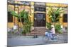 Woman Riding Bicycle Past Restaurant, Hoi an (Unesco World Heritage Site), Quang Ham, Vietnam-Ian Trower-Mounted Photographic Print