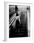 Woman Riding on Escalator in the Time and Life Building-Nina Leen-Framed Photographic Print