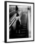 Woman Riding on Escalator in the Time and Life Building-Nina Leen-Framed Photographic Print