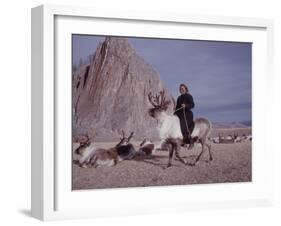 Woman Riding One of Her Reindeer in Outer Mongolia-Howard Sochurek-Framed Photographic Print