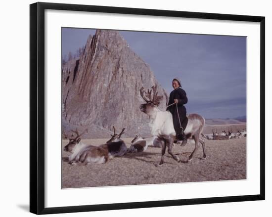 Woman Riding One of Her Reindeer in Outer Mongolia-Howard Sochurek-Framed Photographic Print