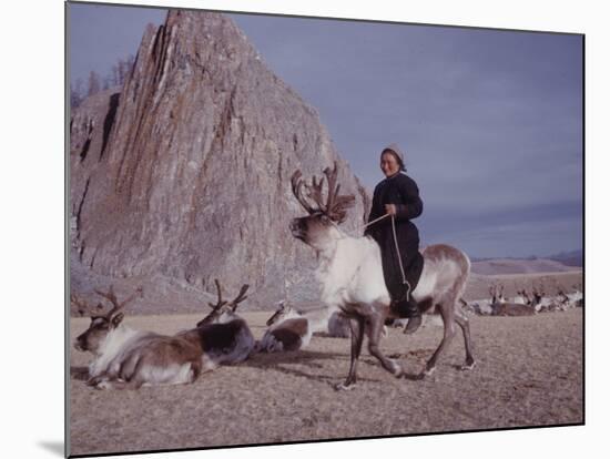 Woman Riding One of Her Reindeer in Outer Mongolia-Howard Sochurek-Mounted Photographic Print