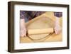 Woman rolling ball of bread dough with a rolling pin, prior to forming it into a loaf.-Janet Horton-Framed Photographic Print