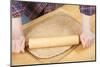 Woman rolling ball of bread dough with a rolling pin, prior to forming it into a loaf.-Janet Horton-Mounted Photographic Print