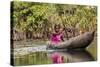 Woman Rowing Traditional Pirogue Down Du River, Monrovia, Liberia-Alida Latham-Stretched Canvas