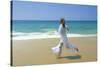 Woman Running Along Beach, Kovalam, Kerala State, India-Gavin Hellier-Stretched Canvas