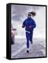 Woman Running During a Snow Storm-null-Framed Stretched Canvas