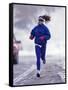 Woman Running During a Snow Storm-null-Framed Stretched Canvas